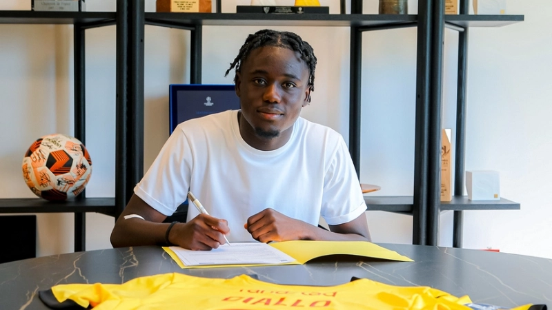 Alpha-Diallo-signature-lens